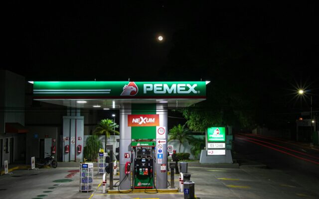 green and white gas station